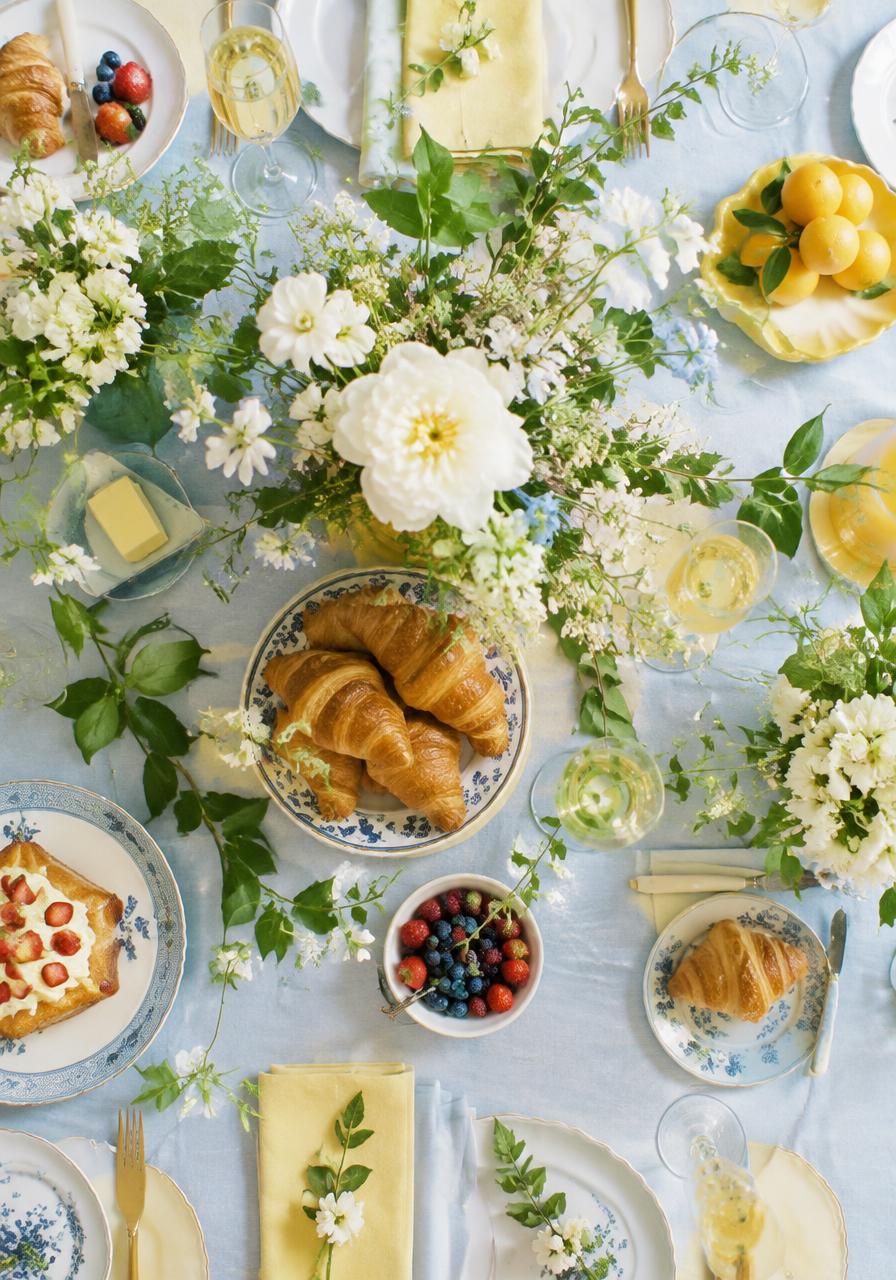 Brunch tablescape with florals and croissants